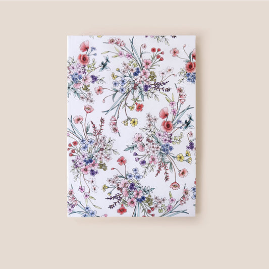 BLOOMS IN WHITE UNLINED NOTEBOOK