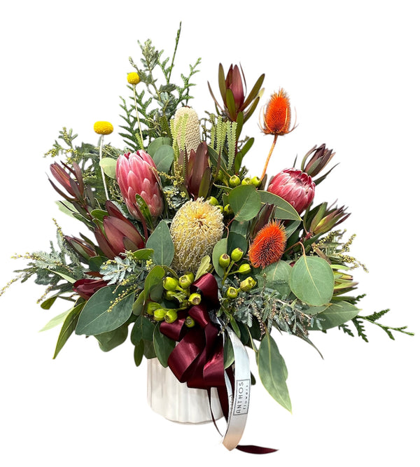 Native Flower Arrangement in Ceramic Vase