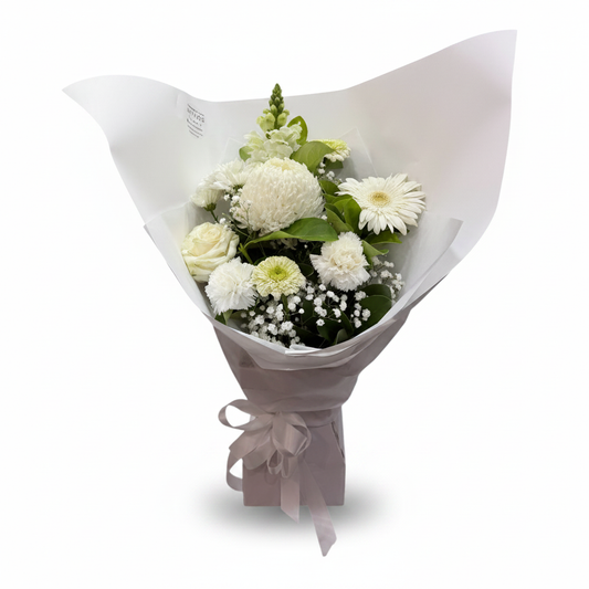 Moonlight bouquet with soft seasonal blooms on a clean warm white background